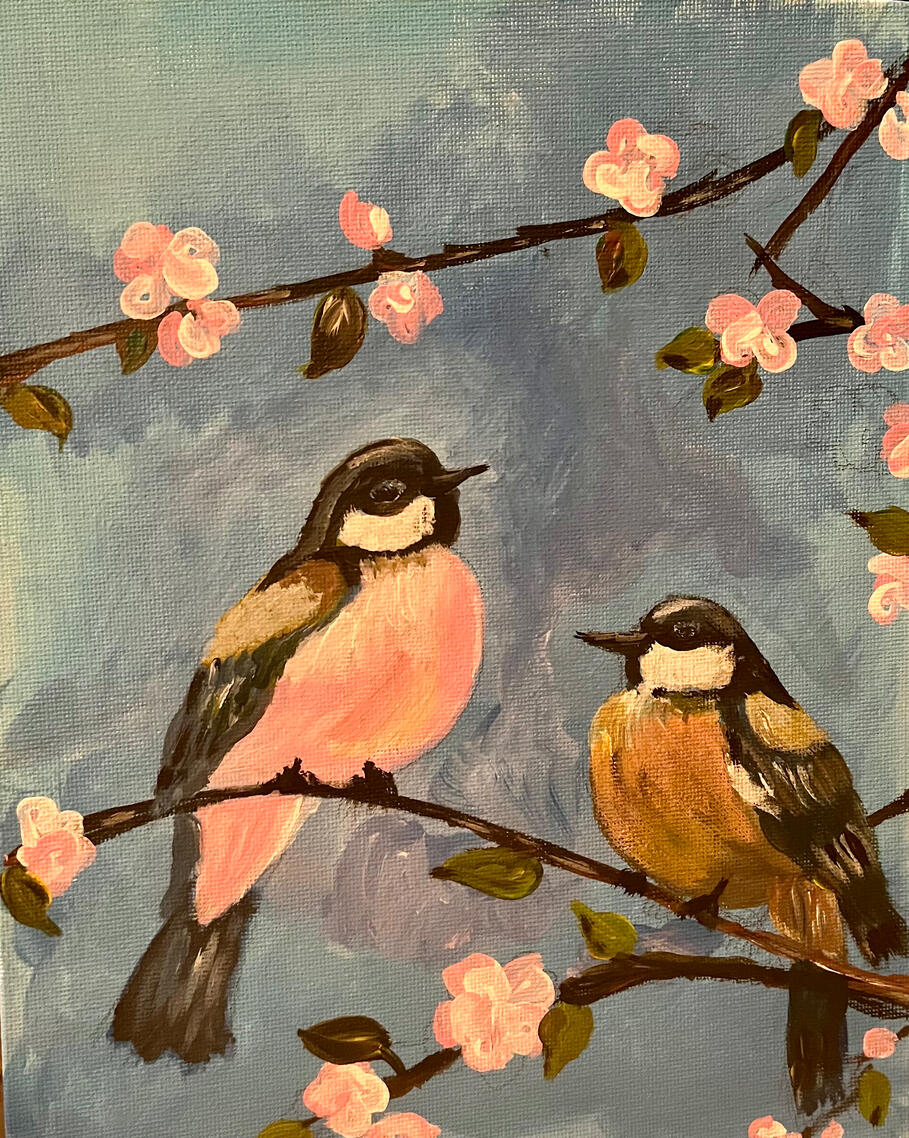 Two more birds busy chatting!