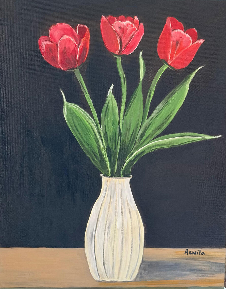 Three tulips in a vase